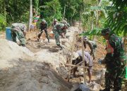 Antusias Warga Desa Jati Pancur Gotong Royong membangun Rabat Beton