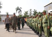 Siap Hadapi Pilkada Serentak 2024, Pj Wali Kota Pimpin Apel Gelar Pasukan Satlinmas dan Petugas Pengamanan