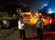 Bhabinkamtibmas Polsek Lemah wungkuk Polres Ciko Patroli Rumah yang Ditinggal Mudik, Pastikan Aman