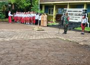 Babinsa Kaliaman Sertu Nurkamid Jadi Pembina Upacara di SDN 1 Kaliaman