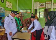 Kepala Desa Seri Tanjung,Gupran Lantik Perangkat Desa yang Baru